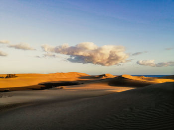 Scenic view of desert against sky during sunset, maspalomas, gran canaria