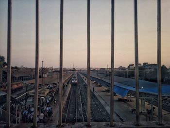 High angle view of railroad tracks against sky during sunset