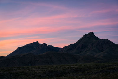 Scenic view of mountains against sky during sunset