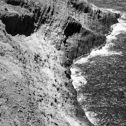 High angle view of rock formation in water