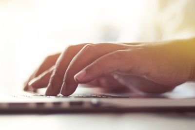 Close-up of man working on table