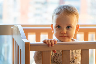 Portrait of cute boy looking away