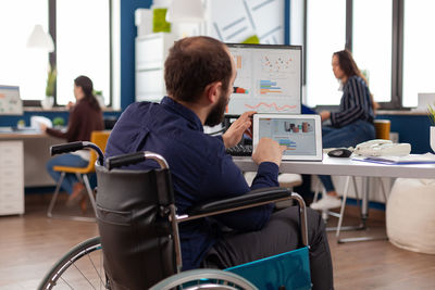 People sitting on table at home