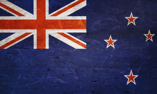 Close-up of flags on wall