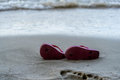 Close-up of toy on sand