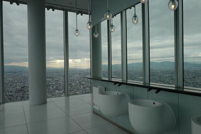 Scenic view of sea seen through glass window