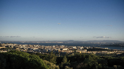 Aerial view of townscape against sky