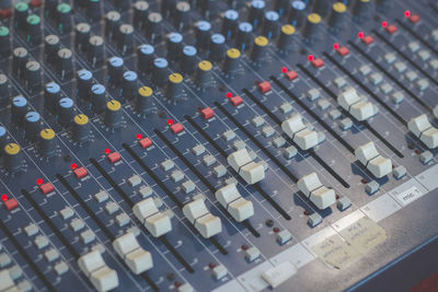 Full frame shot of sound mixer in recording studio