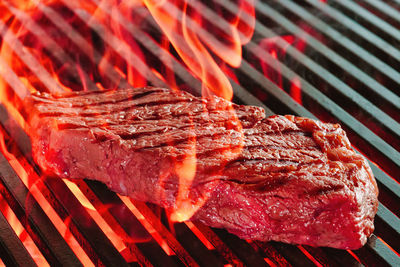 Close-up of meat on barbecue grill