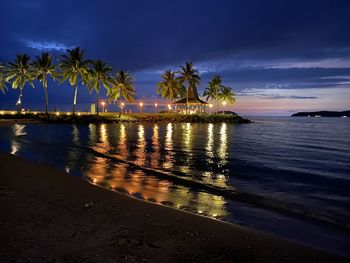 Scenic view of sea against sky at night