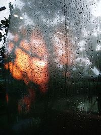 Full frame shot of raindrops on glass window