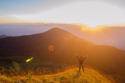 Scenic view of silhouette mountain against sky during sunset