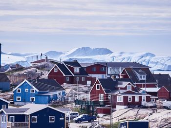 Townscape against sky during winter