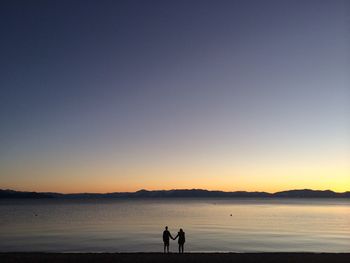 People standing in water