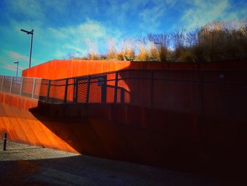 Built structure against sky at sunset