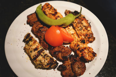 Close-up of grilled meat in plate