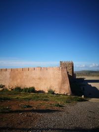 View of fort against clear blue sky