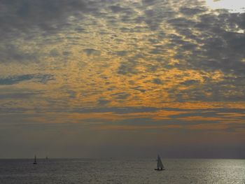 Scenic view of sea at sunset