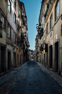 Street amidst residential buildings