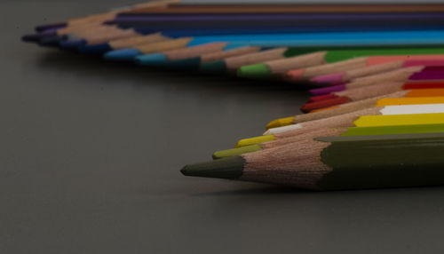 Close-up of colored pencils on table