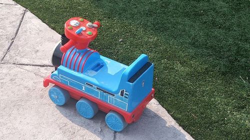 High angle view of toy car on grass