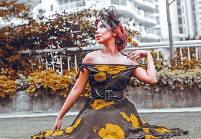 Full length of young woman in park