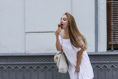 Caucasian white woman having ice cream