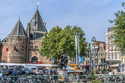 Panoramic shot of buildings against sky in city