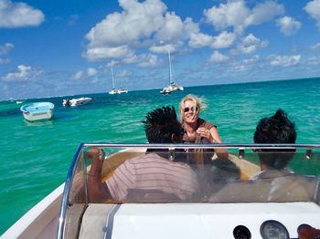 Friends traveling on boat