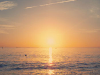 Scenic view of sea during sunset