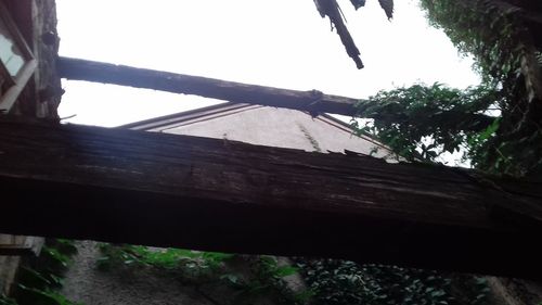 Low angle view of metal structure against sky