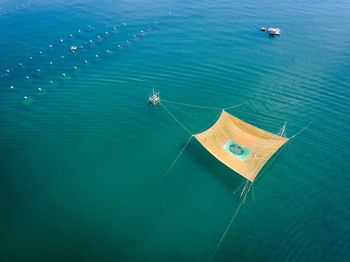 High angle view of sailboat in sea