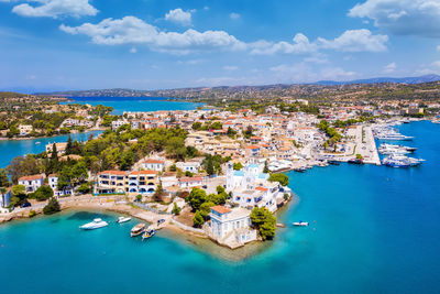 High angle view of townscape by sea