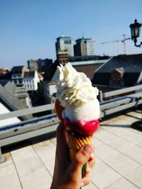 Close-up of ice cream cone on street