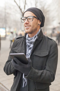 Young man using mobile phone