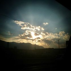 Scenic view of landscape against sky at sunset