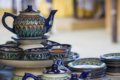 Close-up of ceramic tea pot on table