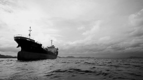 Boat in sea against sky