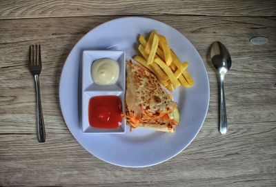 High angle view of breakfast served on table