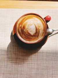 Directly above shot of cappuccino on table
