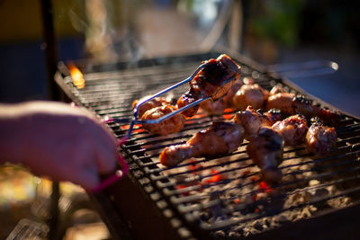 Close-up of meat on barbecue grill