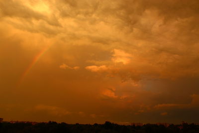 Low angle view of dramatic sky during sunset