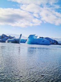 Scenic view of frozen sea against sky