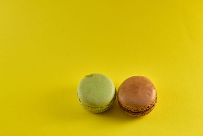 Close-up of cake against yellow background