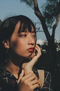 Close-up portrait of a young woman