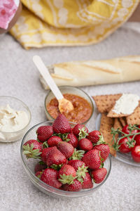 Bowl of strawberries at picnic