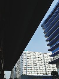 Low angle view of skyscrapers against sky