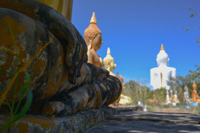 View of temple against building