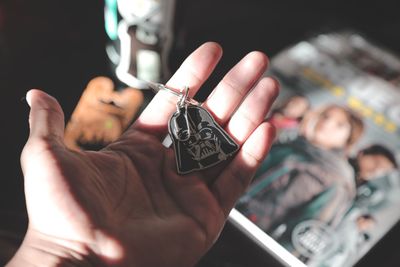 Close-up of man holding hands