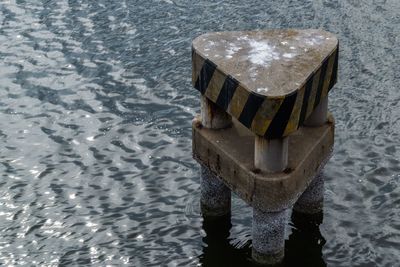 High angle view of water on wood in sea